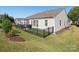 Nice backyard with a fenced-in patio, landscaping and a well-maintained lawn at 26444 Sandpiper Ct, Fort Mill, SC 29707