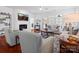 Comfortable living room with fireplace, hardwood floors, and ample seating at 26444 Sandpiper Ct, Fort Mill, SC 29707