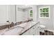 Bright bathroom features a dual-sink vanity with stone countertop and tile surround at 279 Bailey Rd, Lancaster, SC 29720