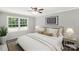 Comfortable bedroom with a queen sized bed, large window, and modern decor at 279 Bailey Rd, Lancaster, SC 29720