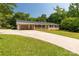 Traditional brick home with a long driveway and mature trees surrounding the property at 279 Bailey Rd, Lancaster, SC 29720