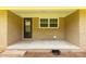 The front porch of the home featuring brick and concrete at 279 Bailey Rd, Lancaster, SC 29720