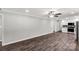Bright kitchen featuring white cabinets, stainless steel appliances, and modern flooring at 279 Bailey Rd, Lancaster, SC 29720