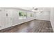 Inviting living room features wood-look floors, neutral walls, and abundant natural light at 279 Bailey Rd, Lancaster, SC 29720