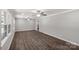 Bright living room with modern flooring, new ceiling fans and natural light at 279 Bailey Rd, Lancaster, SC 29720