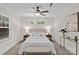 This bedroom features a ceiling fan, neutral paint, carpeted floor, a bed, and a window at 2813 Hilliard Dr, Charlotte, NC 28205