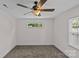 A bedroom featuring a ceiling fan, carpeted floor, baseboard trim, and a window with blinds at 2813 Hilliard Dr, Charlotte, NC 28205