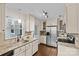 Well-equipped kitchen with stainless steel appliances, granite countertops, and bright lighting at 2813 Hilliard Dr, Charlotte, NC 28205