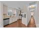 Functional kitchen featuring stainless steel appliances, granite countertops, and ample storage at 2813 Hilliard Dr, Charlotte, NC 28205