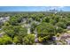Beautiful aerial view of 2819 Georgia Avenue, nestled in a lush neighborhood with a clear view of the Charlotte skyline at 2819 Georgia Ave, Charlotte, NC 28205