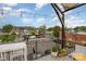 This balcony offers views of the vibrant city and street, along with charming potted plants, creating a welcoming atmosphere at 2819 Georgia Ave, Charlotte, NC 28205