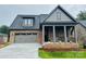 Charming single-Gathering home featuring a covered front porch and two car garage at 29 Shanklin Ln, Denver, NC 28037