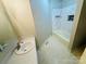 Bathroom with tub/shower combo, tile, and ample counter space at 316 Meadowood Cir, Kannapolis, NC 28081