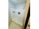 Bathroom featuring tile and a shower/tub combo at 316 Meadowood Cir, Kannapolis, NC 28081