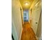 Hallway featuring hardwood floors and access to multiple rooms at 316 Meadowood Cir, Kannapolis, NC 28081