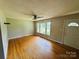 Inviting living room featuring hardwood floors and ample natural light at 316 Meadowood Cir, Kannapolis, NC 28081