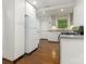 Bright kitchen with white cabinetry, contrasting countertops, and stainless steel appliances at 3339 Benard Ave, Charlotte, NC 28206
