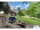 Large backyard with fire pit and seating area at 3505 Mallard Cove Ct, Charlotte, NC 28269