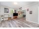Basement with light gray wood-look flooring and an open floor plan at 3505 Mallard Cove Ct, Charlotte, NC 28269