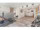 Basement with light gray wood-look flooring and a gray accent wall at 3505 Mallard Cove Ct, Charlotte, NC 28269