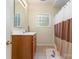 Bathroom with a window of glass blocks and shower at 3505 Mallard Cove Ct, Charlotte, NC 28269