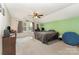Spacious bedroom providing lots of room and featuring a ceiling fan, natural light, and large closet at 3505 Mallard Cove Ct, Charlotte, NC 28269