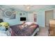Comfortable bedroom with ceiling fan, a closet, and plenty of room for personalization at 3505 Mallard Cove Ct, Charlotte, NC 28269