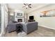 Comfortable living room with a fireplace, ceiling fan, and modern decor at 3505 Mallard Cove Ct, Charlotte, NC 28269