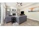 Comfortable living room with a fireplace, ceiling fan, and modern decor at 3505 Mallard Cove Ct, Charlotte, NC 28269