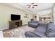Bright living room with view to kitchen featuring sleek furniture and modern decor at 3505 Mallard Cove Ct, Charlotte, NC 28269
