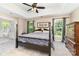 Comfortable main bedroom featuring a trey ceiling, ceiling fan, and lots of natural light at 3505 Mallard Cove Ct, Charlotte, NC 28269