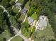 An aerial view showing property lines, home, neighborhood, and surrounding trees at 3735 Gordon St, Terrell, NC 28682