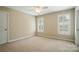 Inviting bedroom featuring neutral carpet, two windows with shutters, and ample natural light at 3735 Gordon St, Terrell, NC 28682