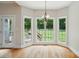 Bright breakfast nook with large windows and a view to the deck and spacious backyard at 3735 Gordon St, Terrell, NC 28682