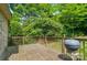 Wooden deck with barbecue grill overlooking the backyard at 3735 Gordon St, Terrell, NC 28682