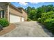 Spacious three-car garage with long driveway and lovely landscaping at 3735 Gordon St, Terrell, NC 28682