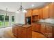 Spacious kitchen with a center island, granite counters, and ample cabinetry at 3735 Gordon St, Terrell, NC 28682