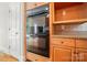 Modern kitchen features stainless steel appliances, granite countertops, and a built-in oven for convenient cooking at 3735 Gordon St, Terrell, NC 28682