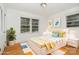 This bedroom features hardwood floors, large window, and neutral walls at 3939 Sheffield Dr, Charlotte, NC 28205