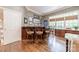 Charming bar area featuring a wooden countertop and stylish bar stools at 4001 Doves Roost Ct, Charlotte, NC 28211