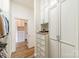 Organized walk-in closet with custom shelving and drawer space for ample storage at 4001 Doves Roost Ct, Charlotte, NC 28211