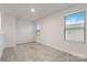 Bonus room featuring neutral paint, carpet, and natural light from two windows at 422 Nixon Rd, Belmont, NC 28012