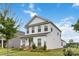 Charming two-story home featuring a covered porch with stone accents and well-manicured landscaping at 422 Nixon Rd, Belmont, NC 28012