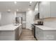 Beautiful kitchen with stainless appliances, white countertops and subway tile at 422 Nixon Rd, Belmont, NC 28012