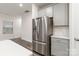 Stainless steel refrigerator and walk-in pantry in modern kitchen at 422 Nixon Rd, Belmont, NC 28012