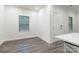 Living space with luxury vinyl plank flooring next to front door at 422 Nixon Rd, Belmont, NC 28012