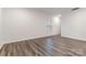 Bright living room with luxury vinyl plank flooring and fresh white walls at 422 Nixon Rd, Belmont, NC 28012