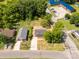 A high angle aerial view of a charming neighborhood, highlighting a gray home with a spacious driveway at 506 Locust St, Rock Hill, SC 29730