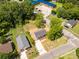 A high angle aerial view of the gray home with its long driveway, next to an apartment building at 506 Locust St, Rock Hill, SC 29730