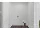 A clean basement with an electrical outlet and laundry hookups offer functionality and potential for customization at 506 Locust St, Rock Hill, SC 29730